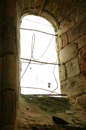 Madame Rouffanche allegedly leaped through this window behind the altar in a church